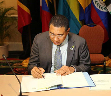 PM Signs Instrument on CARICOM Multilateral Air Services